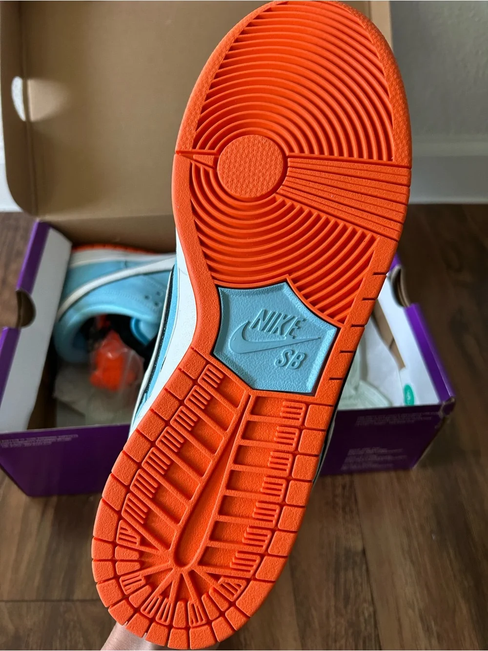 Nike Dunk Low Light Blue with White Swoosh and Orange Outsole